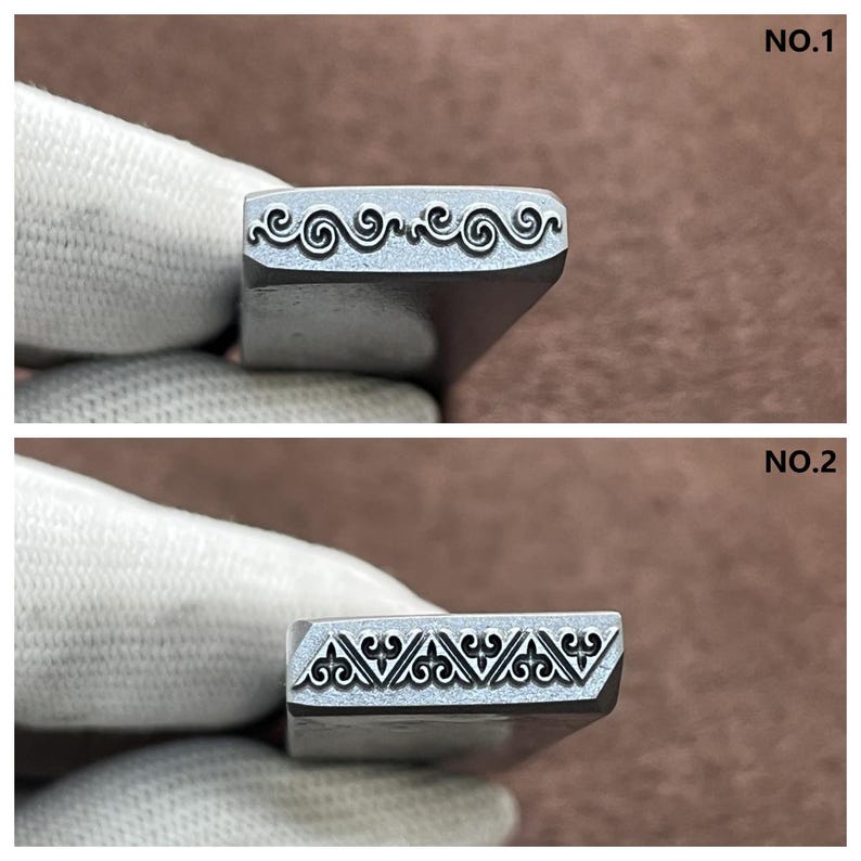 May include: Two metal stamps with different designs. The top stamp has a repeating wave pattern. The bottom stamp has a repeating geometric pattern. The stamps are labeled "NO.1" and "NO.2".
