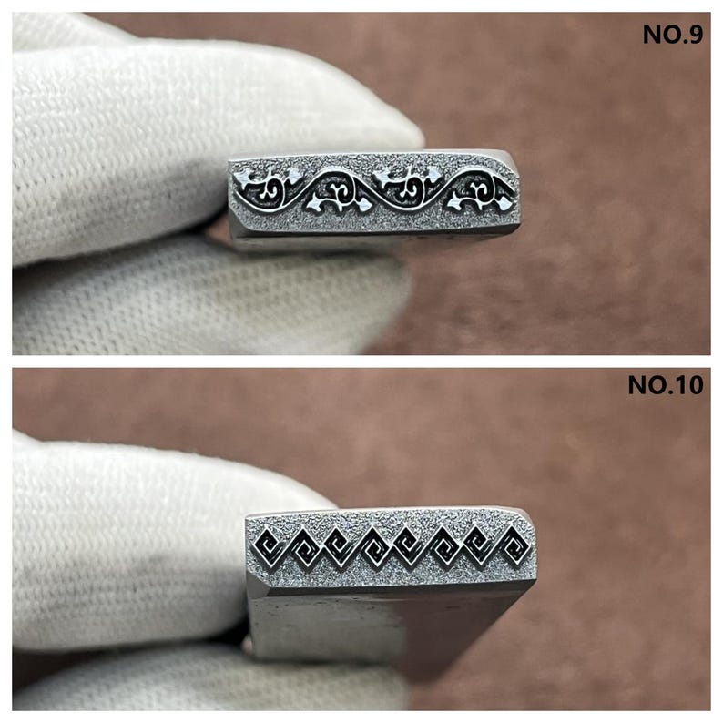 May include: Two metal stamps with different designs. The top stamp has a floral pattern and is labeled "NO.9". The bottom stamp has a geometric pattern and is labeled "NO.10".