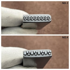 May include: Two metal stamps for leather crafting. The first stamp has a repeating pattern of arrowheads. The second stamp has a repeating pattern of stars.