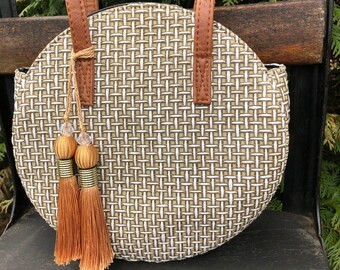 raffia round bolsa