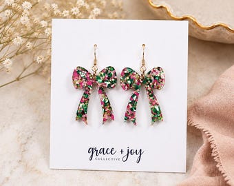 Pink glitter bow earrings, good witch Earrings, pink and green glitter heart wicked earring, birthday gift for musical lover, bow earrings
