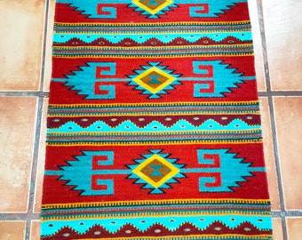 Authentiek Zapotec-tapijt (kaarsen en diamanten) *Traditioneel patroon* 100% schapenwol en natuurlijke kleurstoffen. 24 inch breed x 39 inch breed.