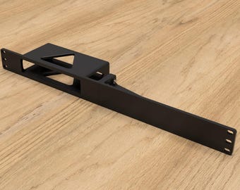 May include: Black metal bracket with a rectangular cutout and a triangular cutout. The bracket is designed to be mounted to a wall or other surface.