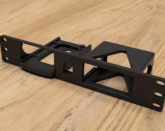 May include: Black metal bracket with multiple cutouts and holes. The bracket is designed to hold a device or other object.
