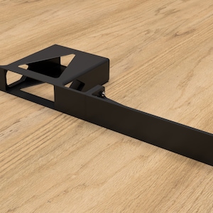 May include: Black metal bracket with a rectangular shape and a triangular cutout. The bracket is designed to support a shelf or other object.