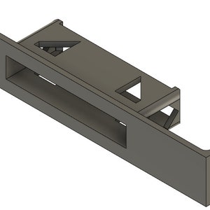 May include: A gray plastic 3D printed part with a rectangular opening and a logo on the side. The part has a series of holes on one end.