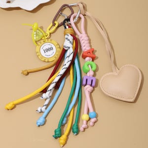 Dijes para bolso con nudo de corazón rosa, dijes para bolso con nombre personalizado, dijes para bolso con letras rosas, dije de cuerda Y2k Purese, accesorios para llavero de bolso.
