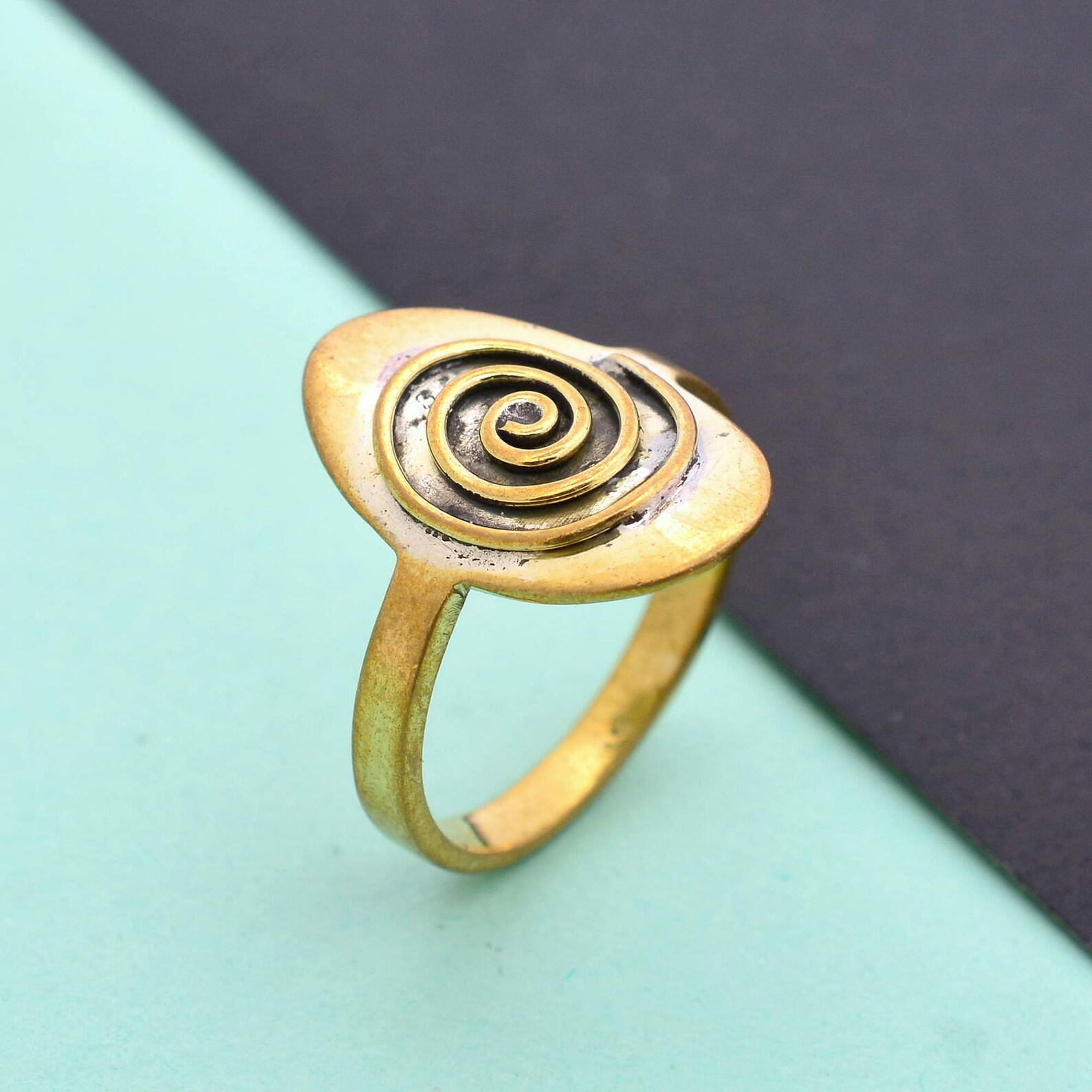 A spiral ring made of Brass is going to add shine to your | Etsy