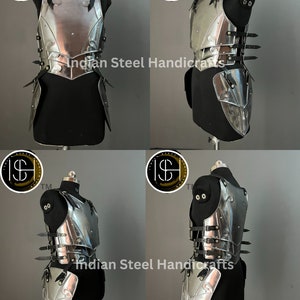 May include: A silver metal breastplate and skirt armor set with black leather straps. The armor is displayed on a black mannequin. The image includes the text "Indian Steel Handicrafts".