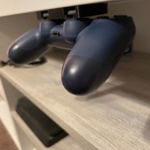 Universelle xbox/playstation Untertischhalterung