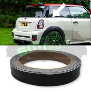 May include: Black vinyl pinstripe tape, rolled on a cardboard core. The tape is approximately 6mm wide.