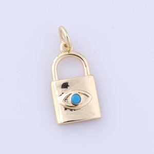 May include: Gold padlock charm with a blue evil eye design. The charm is a popular symbol of protection and good luck.