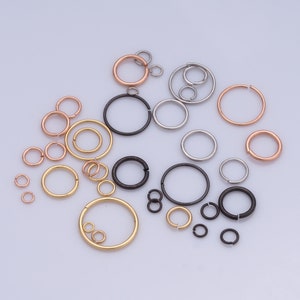 May include: Assortment of jump rings in various sizes and colours, including gold, silver, and rose gold. These jump rings are ideal for jewellery making and crafting.
