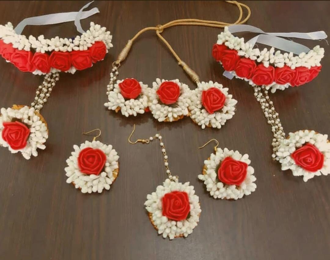 White and red flower jewellery deals