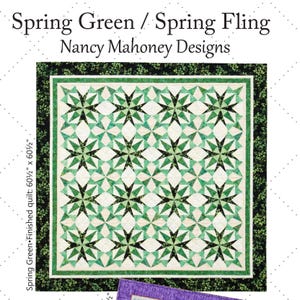 May include: A quilt titled Spring Green / Spring Fling by Nancy Mahoney Designs featuring a repeating star pattern in shades of green and cream. The quilt has a black floral border and measures 60.5 inches by 60.5 inches as stated in the text.
