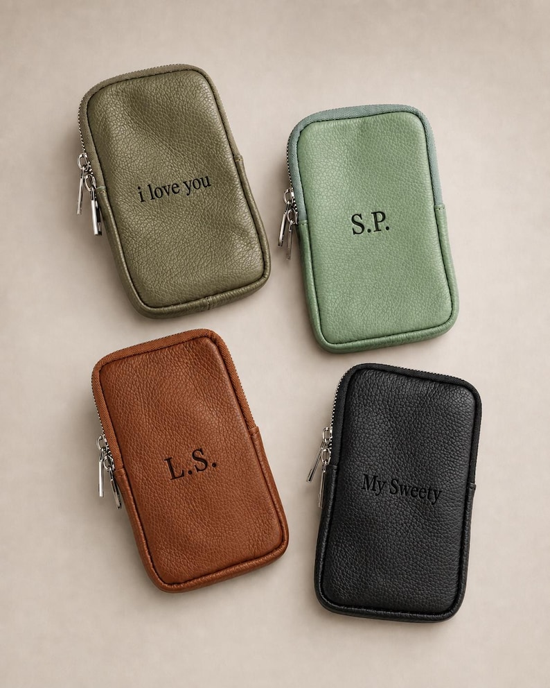 May include: Four rectangular zippered pouches in olive green, sage green, brown, and black. Each pouch features a textured surface and a silver-tone zipper. The olive pouch says i love you, the sage says S.P., the brown says L.S., and the black says My Sweety.