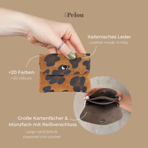 a woman's hand holding a purse with instructions on how to fold it