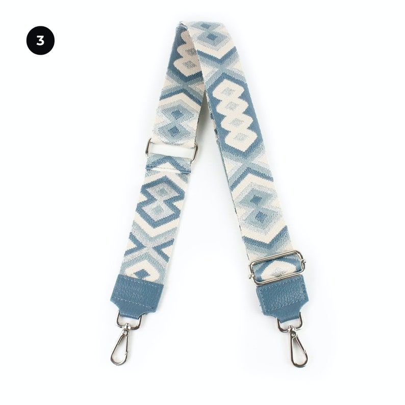 a blue and white lanyard strap with a pattern on it