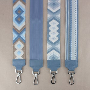 three lanyards with a blue and white design on them