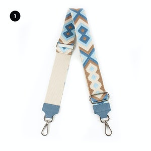 a camera strap with a blue and brown pattern