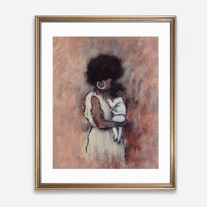 May include: A framed art print depicting a mother and child. The illustration uses a sketch-like style with a warm palette of pinks and browns. The mother wears a cream dress and hoop earrings. The baby is wrapped in white.