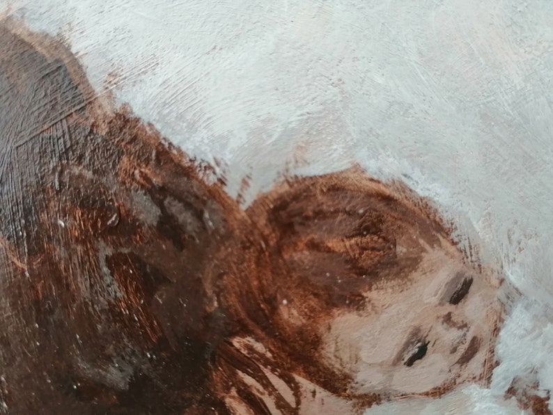 May include: A close-up of a painting depicting a person's face. The face is painted in shades of brown and white, with the eyes closed. The background is a light blue color.