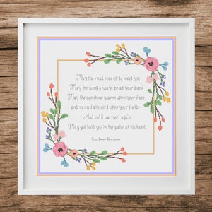 May include: A cross-stitch pattern with a floral border and an Irish blessing that reads: "May the road rise up to meet you, May the wind always be at your back, May the sun shine warm upon your face and rains falls soft upon your fields, And until we meet again, May god hold you in the palm of his hand. Old Irish Blessing."