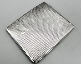 Portasigarette Art Déco in argento sterling. S. M. Levi, Birmingham, 1934