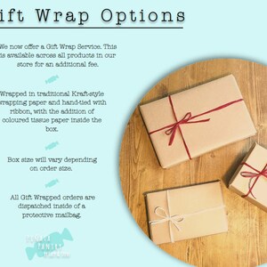 May include: Three gift boxes wrapped in brown Kraft paper with red ribbon tied in bows. The boxes are on a wooden surface, with the text "Gift Wrap Options" at the top. The text describes the gift wrap service.