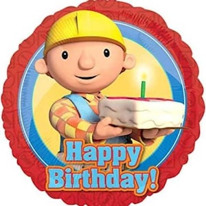 May include: A round, red and blue birthday balloon featuring a cartoon character wearing a yellow hard hat and holding a cake with a lit green candle. The words "Happy Birthday!" are displayed in blue and orange.