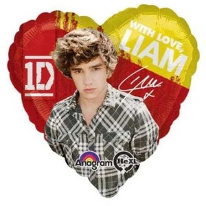 May include: Red and yellow heart-shaped balloon with a picture of a boy with brown hair and a plaid shirt. The balloon has the text "1D" and "With Love, Liam" on it.