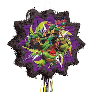 May include: A black star-shaped Teenage Mutant Ninja Turtles piñata with a purple and green background. The four turtles are depicted in their signature poses, with their weapons and masks.