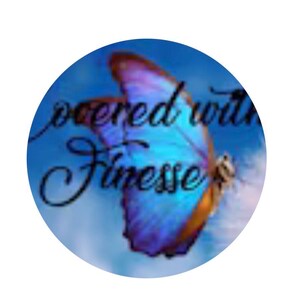 May include: A round image with a blue background featuring a butterfly with purple and orange wings. The image has the words "covered with Finesse" in cursive script.