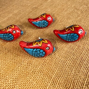 Four quirky bird drawer handles