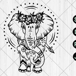 May include: Black and white illustration of an elephant with a baby elephant, both adorned with floral crowns. The design is encircled by a dotted line and includes file type icons: SVG, DXF, PNG, and JPG.