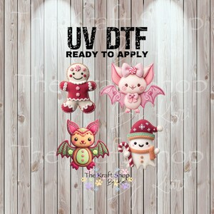 May include: UV DTF ready to apply transfers featuring a gingerbread man, a pink bat with a bow, a bat with green wings, and a snowman with a candy cane. The text "UV DTF READY TO APPLY" is at the top.