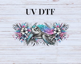 May include: A colorful sea turtle with a galaxy design on its shell is surrounded by pink, white, and blue flowers. The text "UV DTF" is at the top of the image.