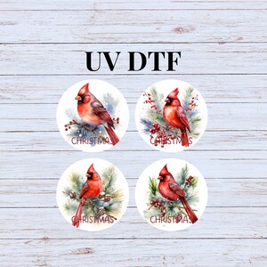 May include: Four round stickers with a watercolor design of a cardinal bird on a wintery branch with red berries. The stickers say "Christmas" at the bottom.