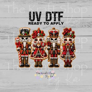 May include: A set of four UV DTF ready to apply transfers featuring gothic nutcracker characters in red, black, and white. The designs include two male nutcrackers with top hats and two female nutcrackers with bows, all decorated with skull motifs.