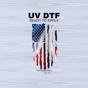 May include: A distressed American flag design with red, white, and blue colors. The text "UV DTF READY TO APPLY" is above the flag. The text "The Kraft Shop By Kai" is below the flag.