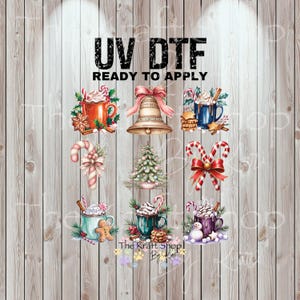 May include: UV DTF ready to apply Christmas-themed designs. The image features various festive illustrations, including mugs of hot cocoa, candy canes, a bell, a Christmas tree, and gingerbread men, all set against a wood-grain background.