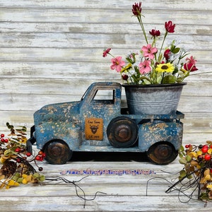 Personalized huge rustic farmhouse metal rusty truck with a personalized leather patch on the doors. Farm truck planter.