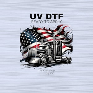 May include: A black semi-truck with an American flag in the background. The text "UV DTF READY TO APPLY" is above the truck. The text "The Kraft Shop By Kai" is below the truck.