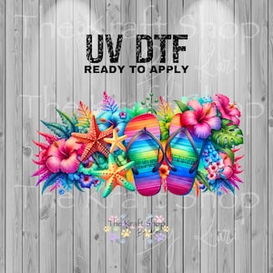 May include: A colorful UV DTF transfer design featuring rainbow flip-flops, starfish, and tropical flowers. The text "UV DTF READY TO APPLY" is displayed above the design. The Kraft Shop By Kari logo is at the bottom.