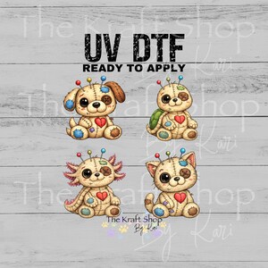 May include: UV DTF transfers featuring four stitched animal designs: a dog, turtle, axolotl, and cat. Each has a heart, button eyes, and colorful pins. The text "UV DTF READY TO APPLY" is at the top.