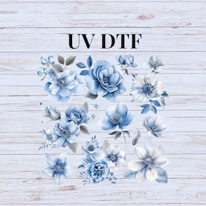 May include: A collection of blue and white watercolor floral illustrations on a light blue wood background. The text "UV DTF" is at the top of the image.