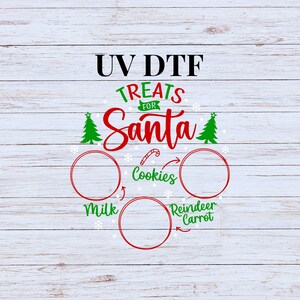 May include: A white wood background with red and green text that reads "UV DTF Treats for Santa". There are three red circles with white outlines, each with a different treat listed inside: "Cookies", "Milk", and "Reindeer Carrot".