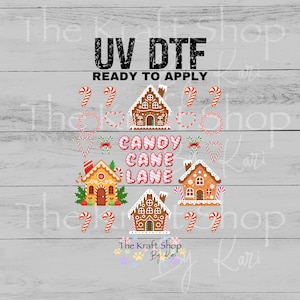 May include: A digital graphic featuring the text "UV DTF READY TO APPLY" above gingerbread houses, candy canes, and the words "CANDY CANE LANE." The Kraft Shop by Kari logo is at the bottom.