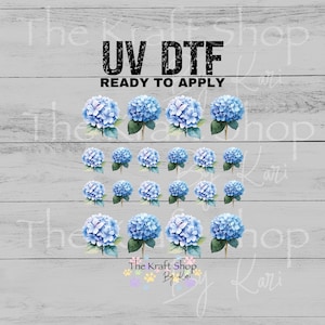 May include: UV DTF transfers featuring watercolor-style blue hydrangea flowers with green leaves. The text "UV DTF READY TO APPLY" is displayed in black. The Kraft Shop By Kari logo is at the bottom.