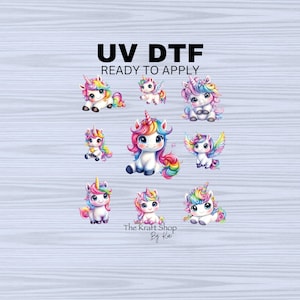 May include: A set of 8 colorful unicorn iron-on transfers. The unicorns are in various poses, with rainbow manes and tails. The transfers are ready to apply to fabric using a heat press or iron.